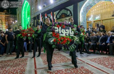 وفد العتبة العلوية المقدسة يشارك بمراسم تبديل راية قبة الإمامين الكاظميين في ذكرى شهادة الإمام الجواد(عليهم السلام)