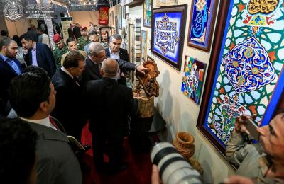 معروضات قسم المنقوشات وإحياء التراث التابع للعتبة العلوية في معرض بغداد الدولي تنال إعجاب الوافدين 