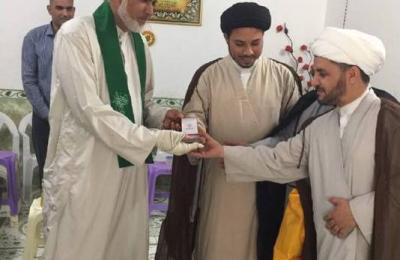 وفد من لجنة الإرشاد في العتبة العلوية يزور الجريح الشيخ المنصوري في قضاء الهاشمية في محافظة بابل 