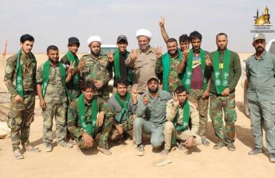 لجنة الإرشاد في العتبة العلوية تشارك الحشد الشعبي في قصف مواقع لداعش الإرهابي على الحدود العراقية السورية وينقلون توصيات ودعاء المرجعية لهم 