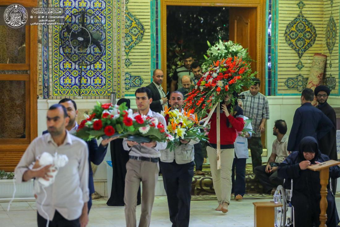 الشباك المقدس للمولى أمير المؤمنين (علية السلام) يتزين بالزهور في ذكرى ولادته العطرة | 