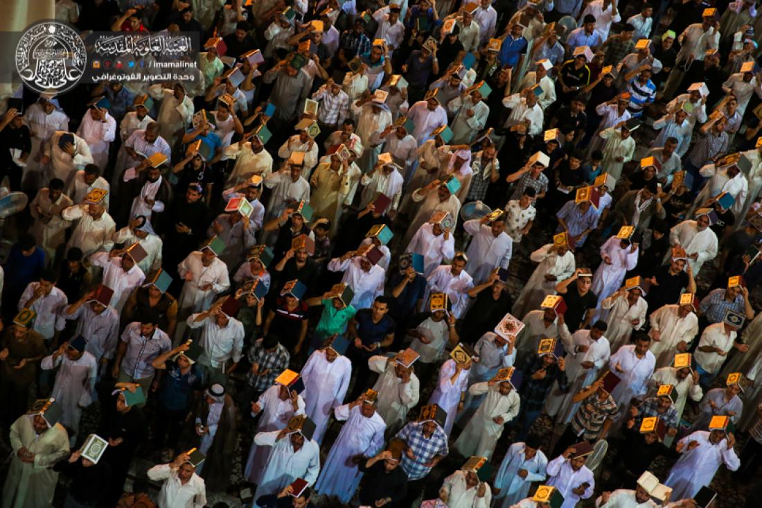 تقرير مصور : رفع المصاحف في اول ليلة من ليالي القدر المباركة في العتبة العلوية المقدسة  | 