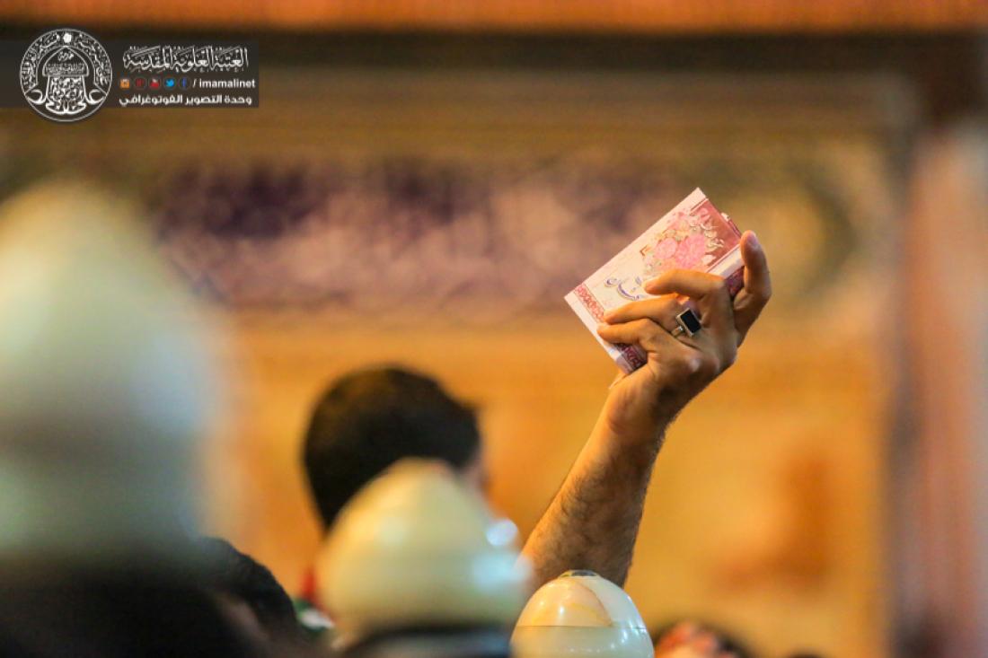 تقرير مصور : رفع المصاحف في اول ليلة من ليالي القدر المباركة في العتبة العلوية المقدسة  | 
