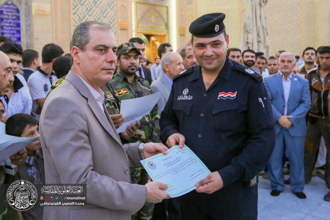 تقرير مصور : استعراض تخرج الدوره العسكرية لطلاب جامعة الكوفة قرب الحرم العلوي المشرف  | 