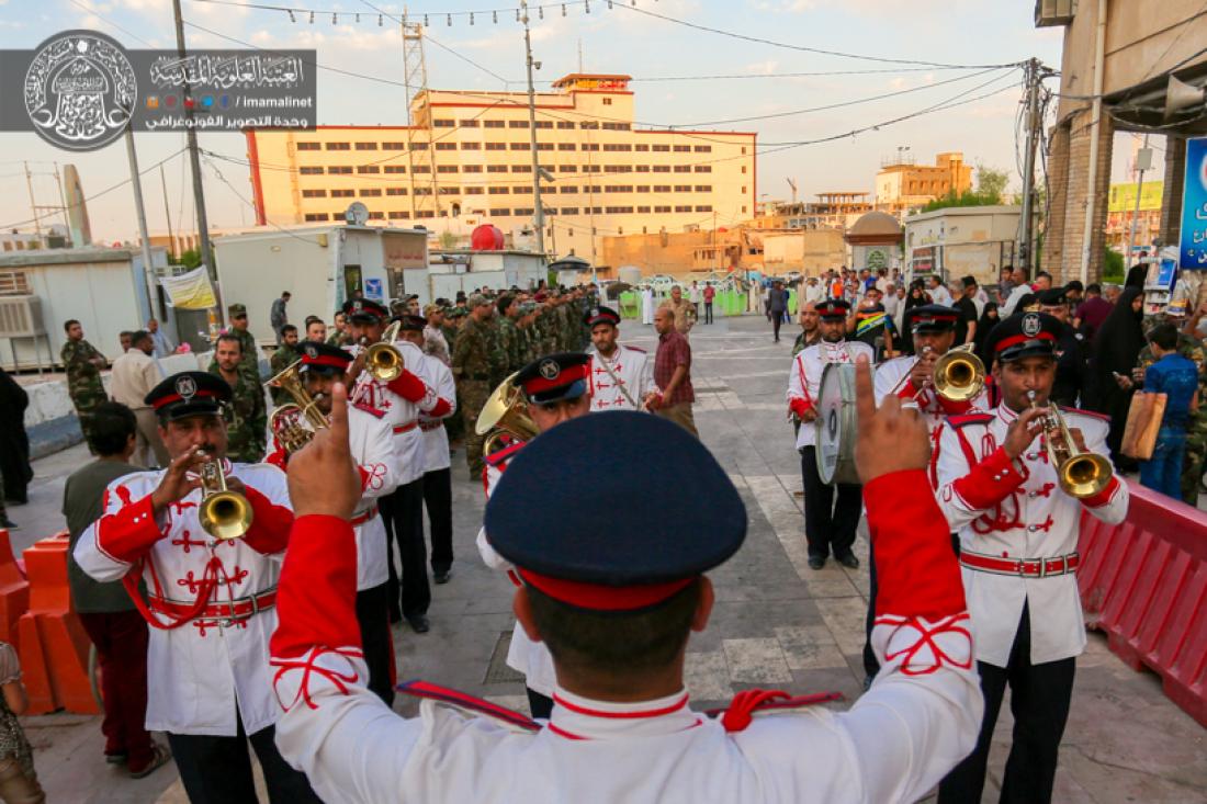 تقرير مصور : استعراض تخرج الدوره العسكرية لطلاب جامعة الكوفة قرب الحرم العلوي المشرف  | 