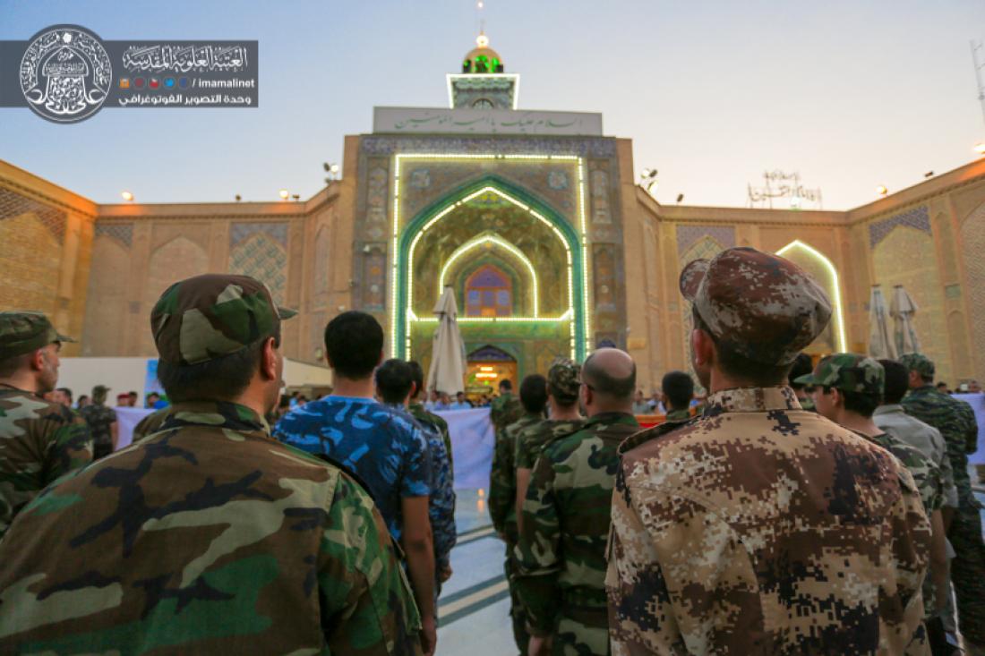 تقرير مصور : استعراض تخرج الدوره العسكرية لطلاب جامعة الكوفة قرب الحرم العلوي المشرف  | 